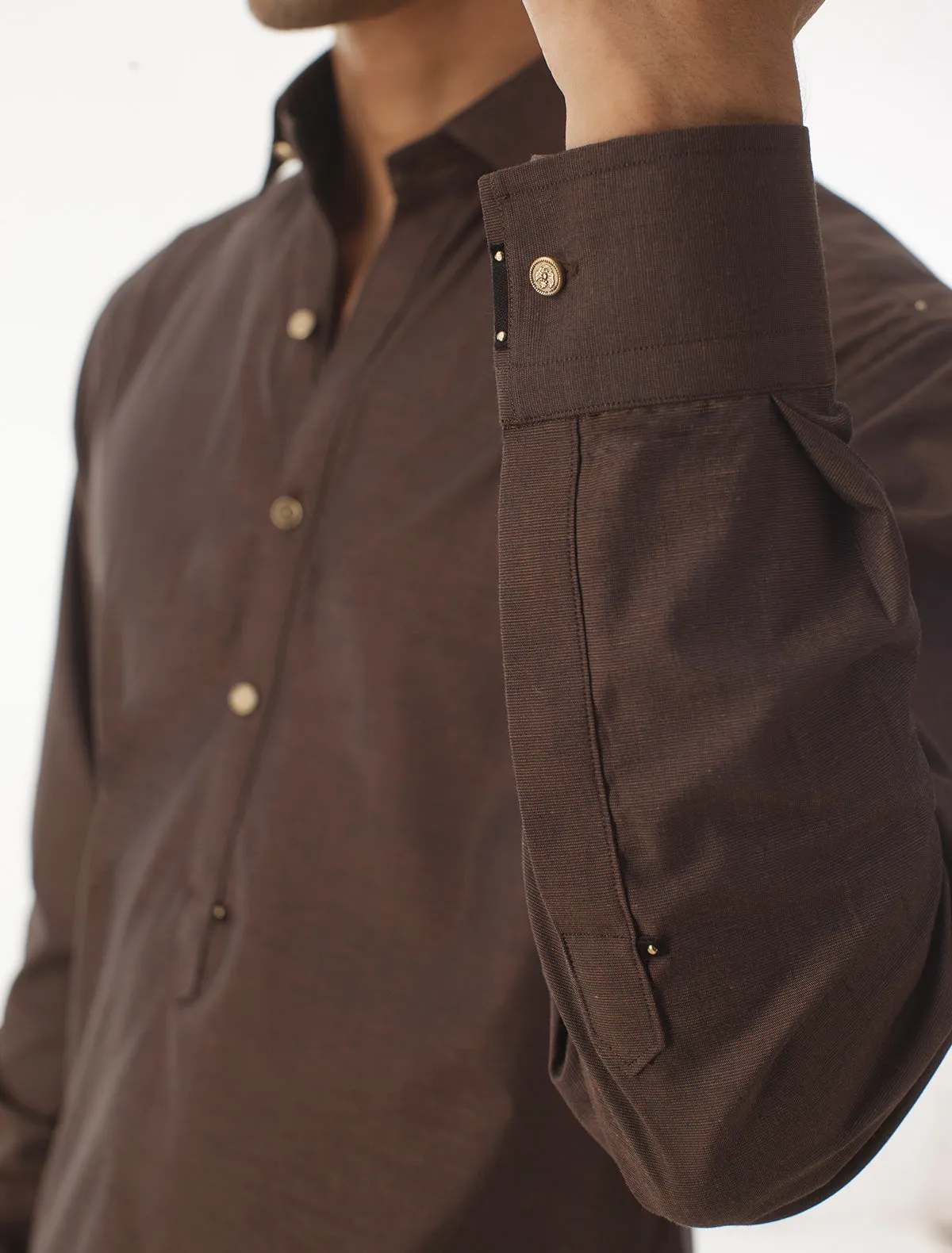 BROWN KAMEEZ SHALWAR WITH UNIQUE DETAILS
