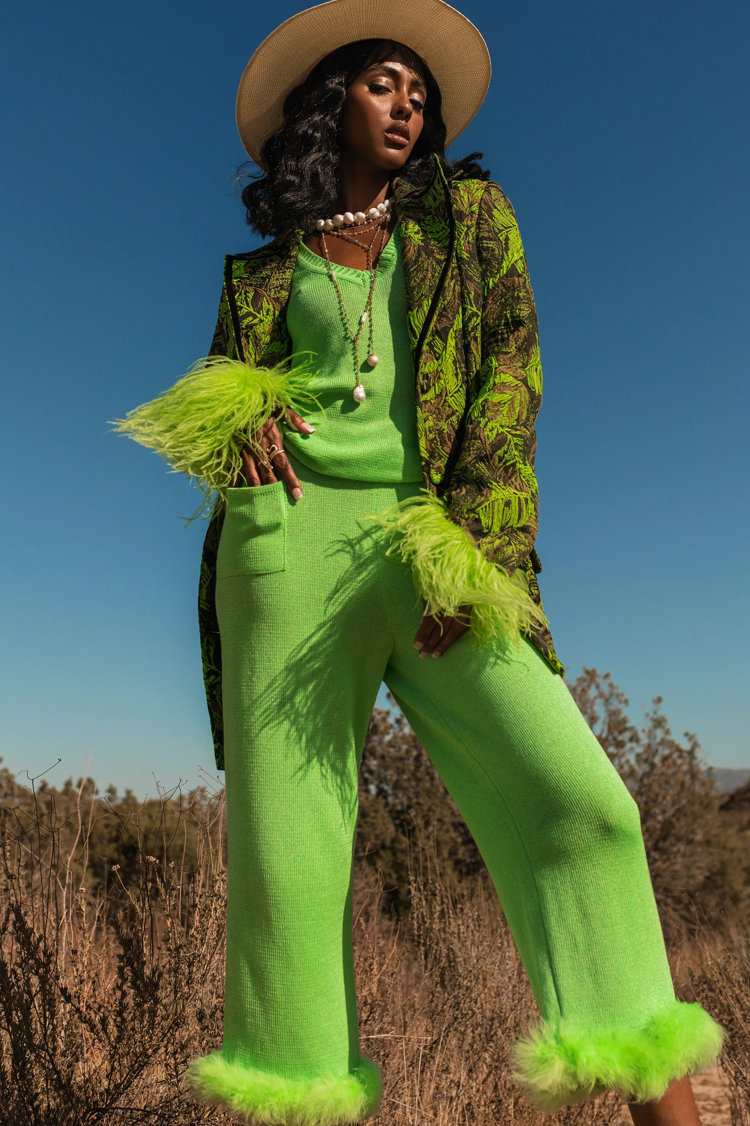 Mint knit pants with feather details