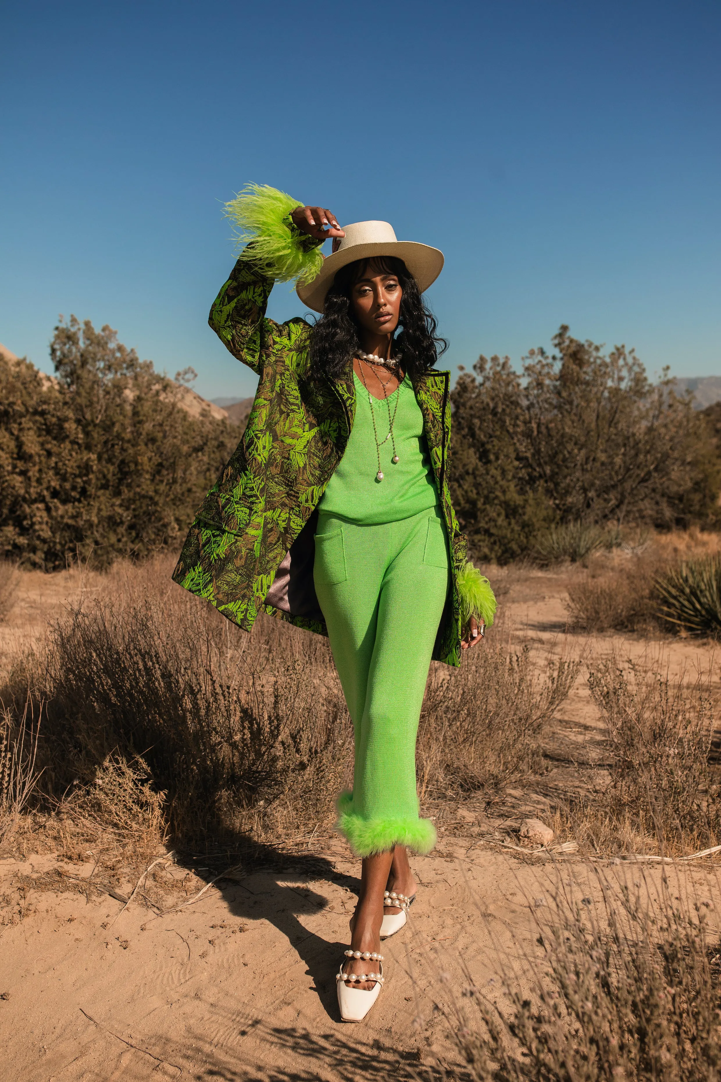 Mint knit pants with feather details