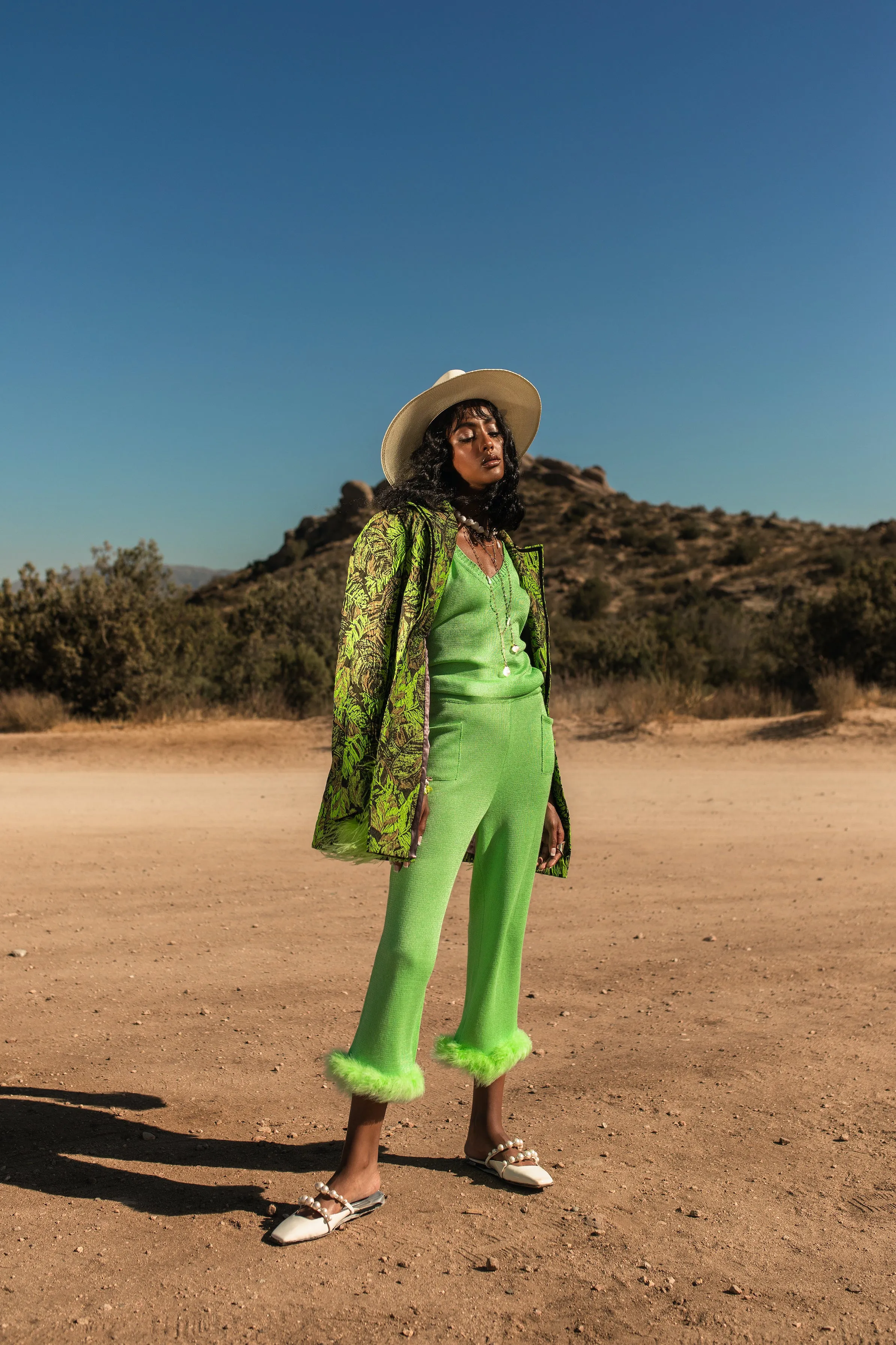 Mint knit pants with feather details